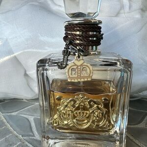 Viva la Juicy Couture Gold Perfume Bottle 
The product contains  75% of perfume